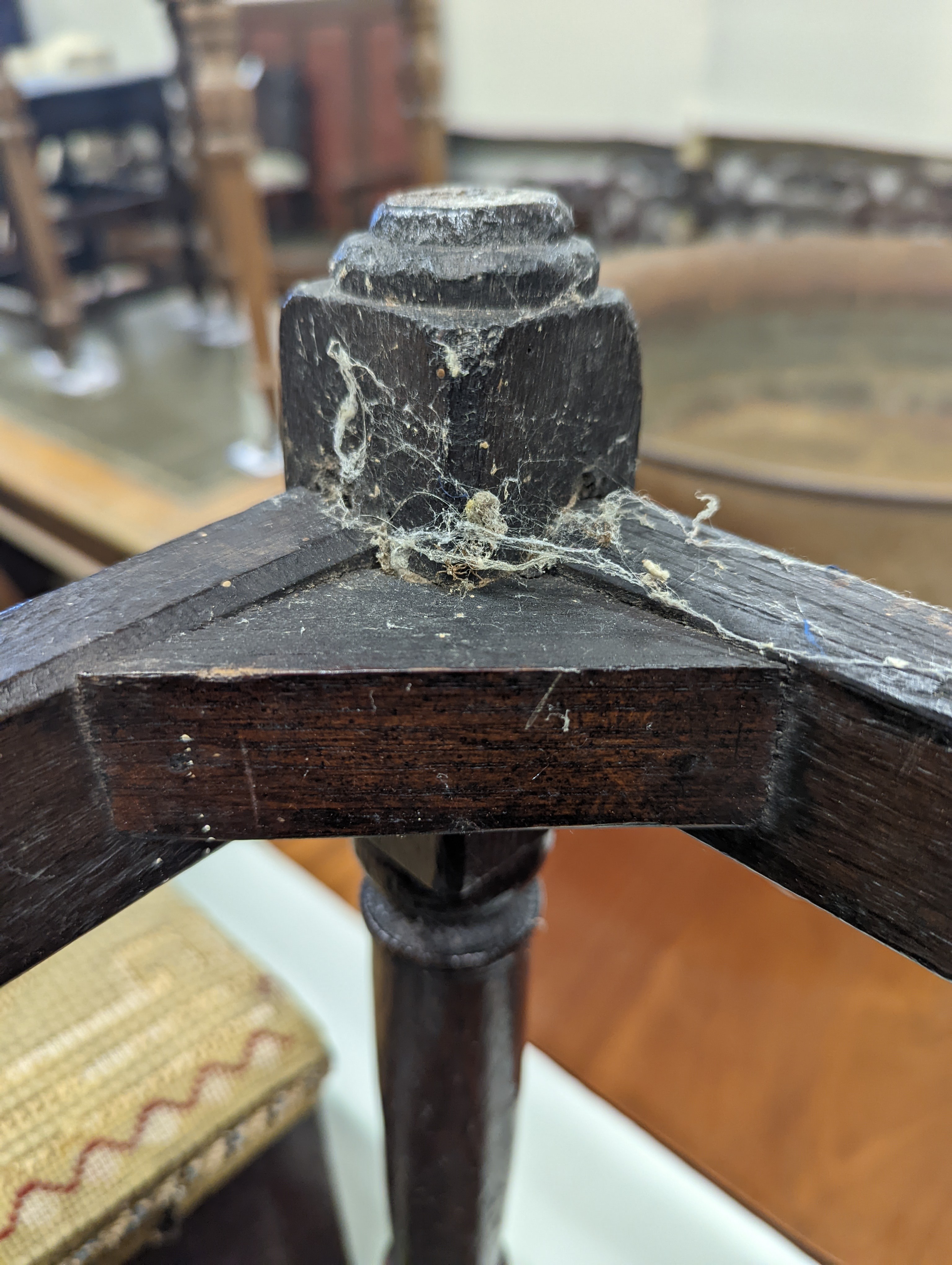 A 17th century style oak joint stool, width 46cm, depth 26cm, height 46cm and a George III stool with Victorian needlework seat, length 33cm